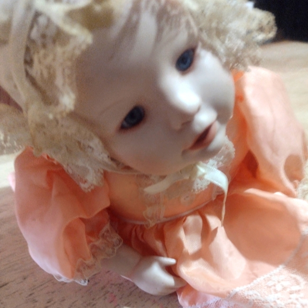 Porcelain Doll in Peach Dress